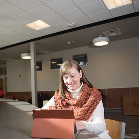 Joy Cheatham poses for photo in Maynard Math and Science building