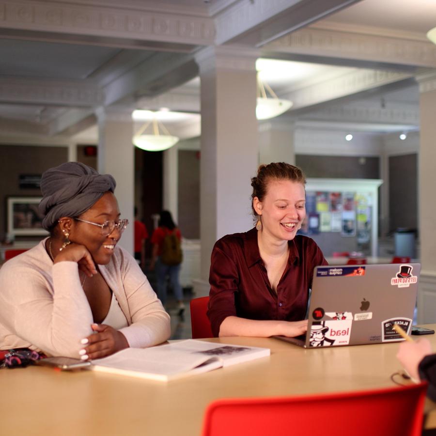 Students sitting at a table talking